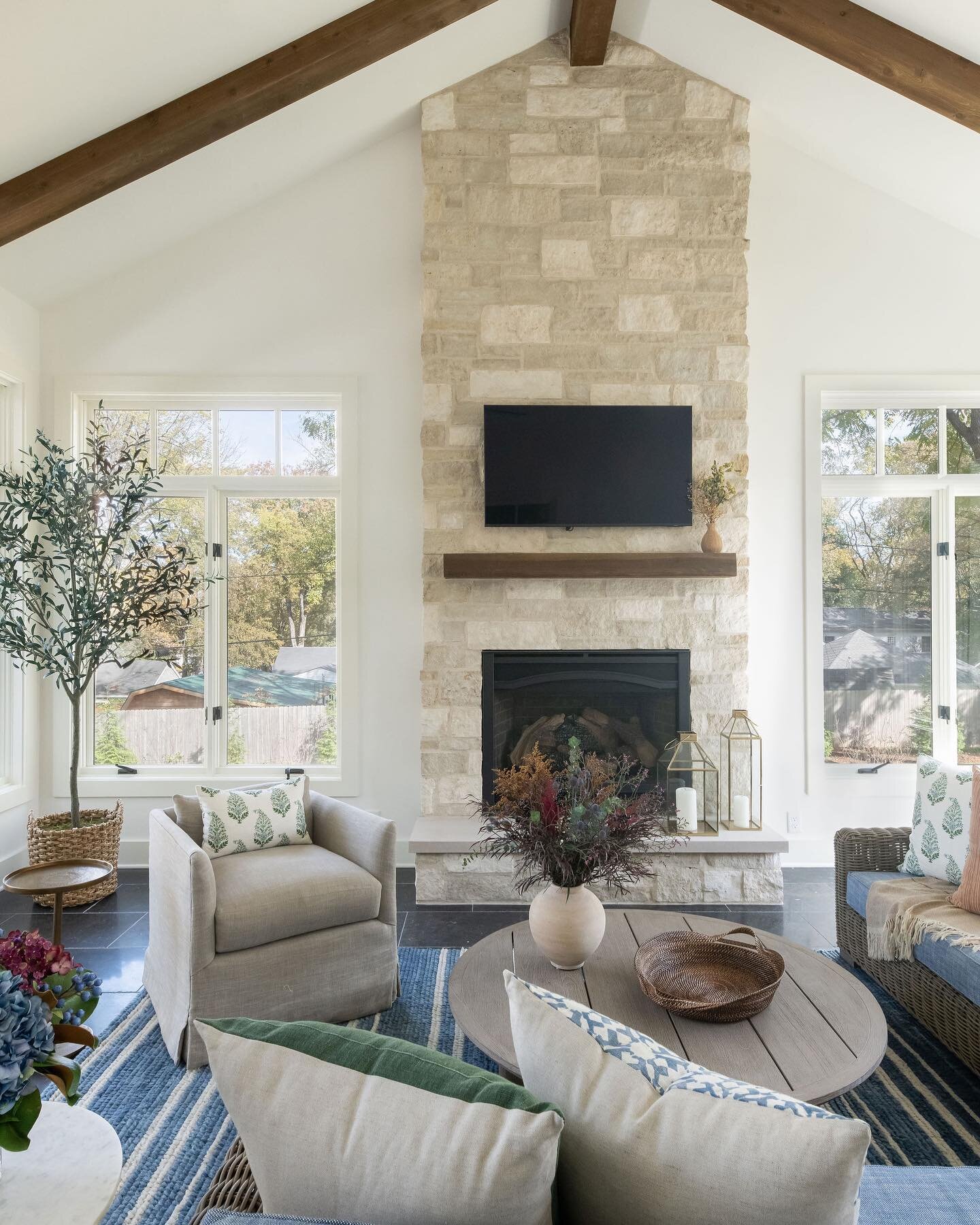 Not a single detail was overlooked, no stone left unturned. In order to find the perfect stone for this fireplace, we ended up needing to create a custom blend at the stoneyard, which they loved so much they created a new collection and named it afte