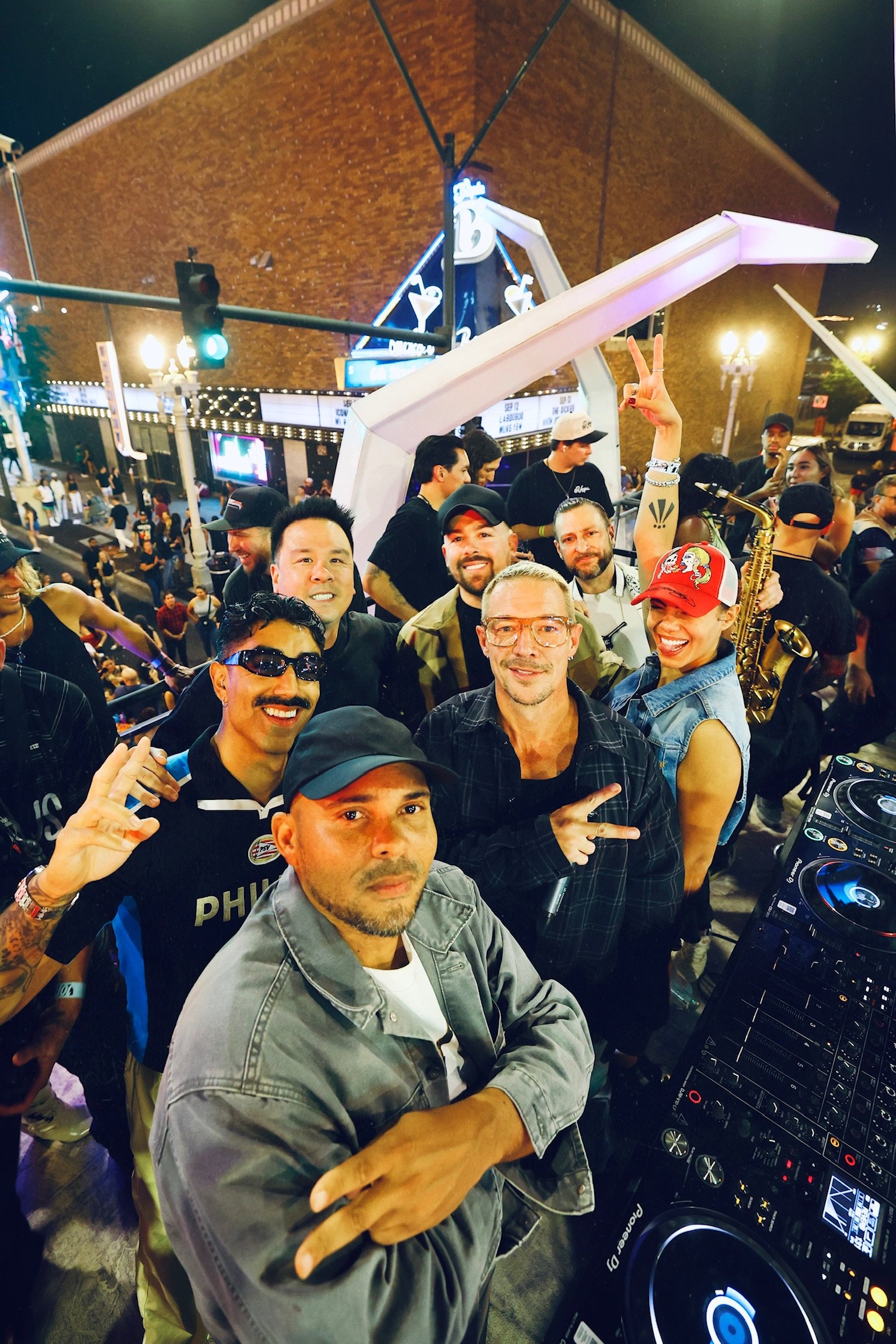 Silhouetted shot of Major Lazer against a backdrop of intense LED visuals and laser lighting at Feed The Block DTLV.