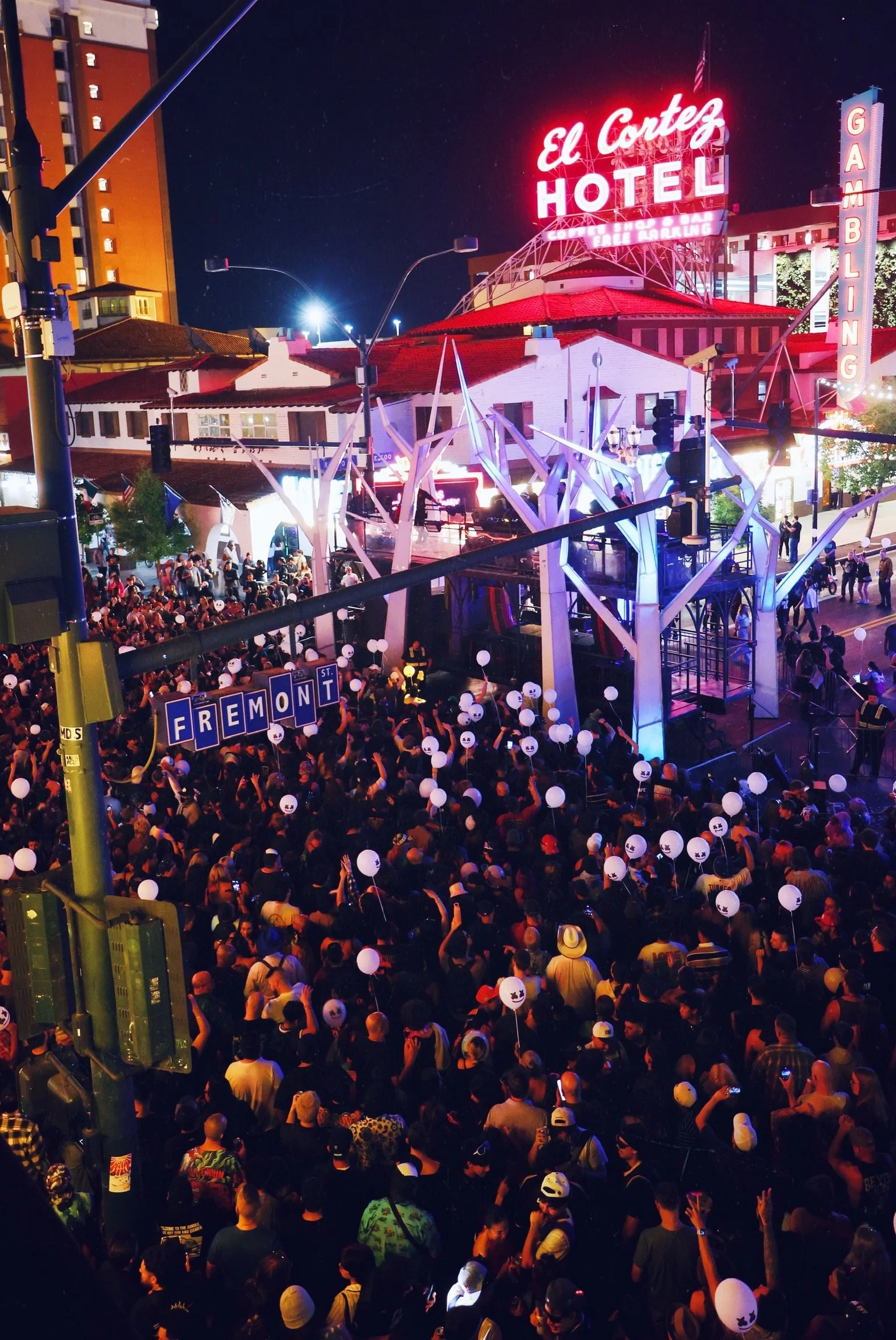 Wide-angle shot of the Feed The Block main stage in Downtown Las Vegas, showcasing professional stage lighting, massive LED screens, and high-production value for local music festivals. @dmahoneyphoto