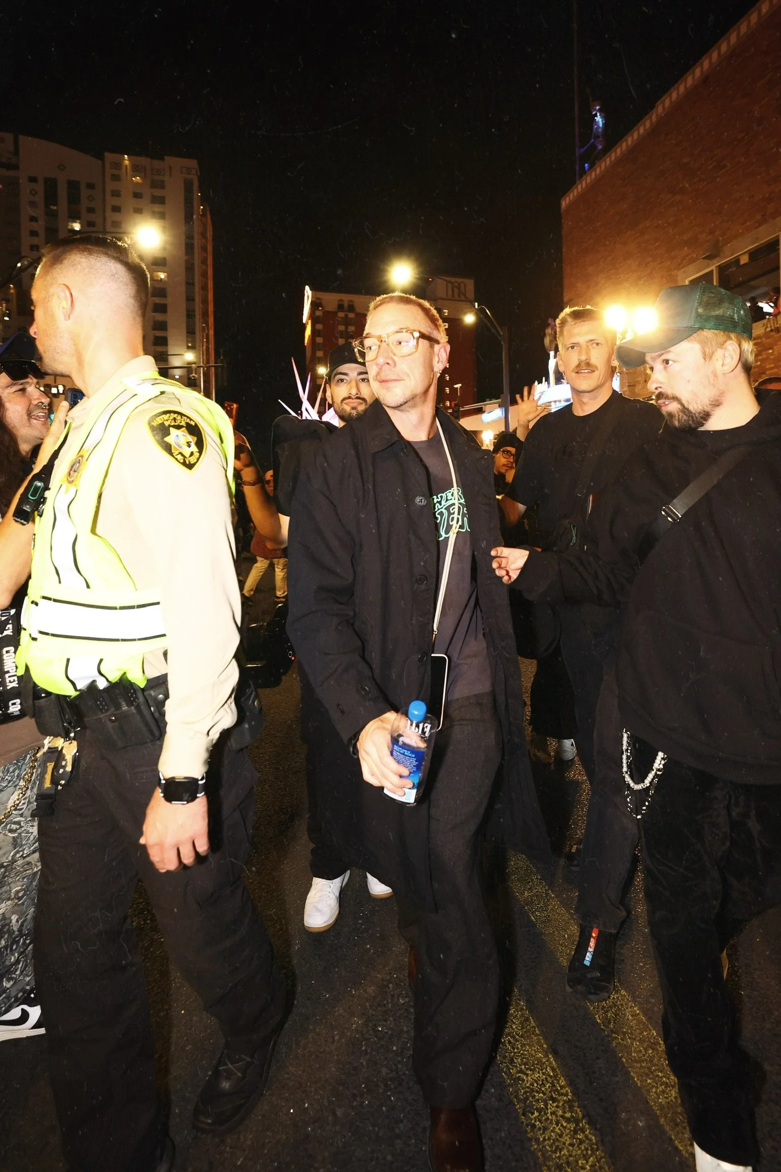 Massive Halloween crowd at Commonwealth DTLV featuring a person in a gorilla suit, capturing the high-energy atmosphere of Wynn Nightlife and Corner Bar Management events.