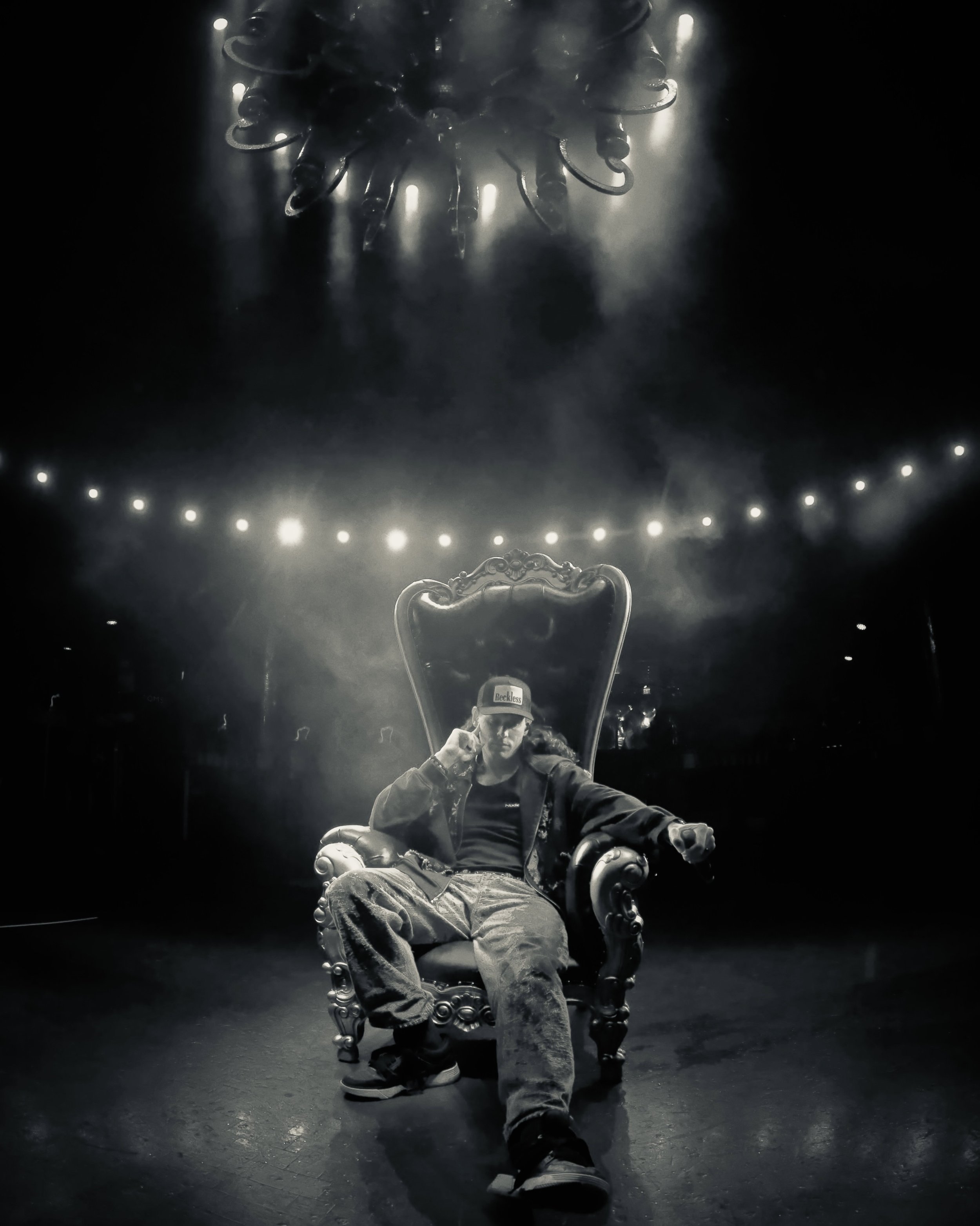 Sullivan King sitting on a throne on the XS Las Vegas dance floor Sunday Night Swim Main Stage.