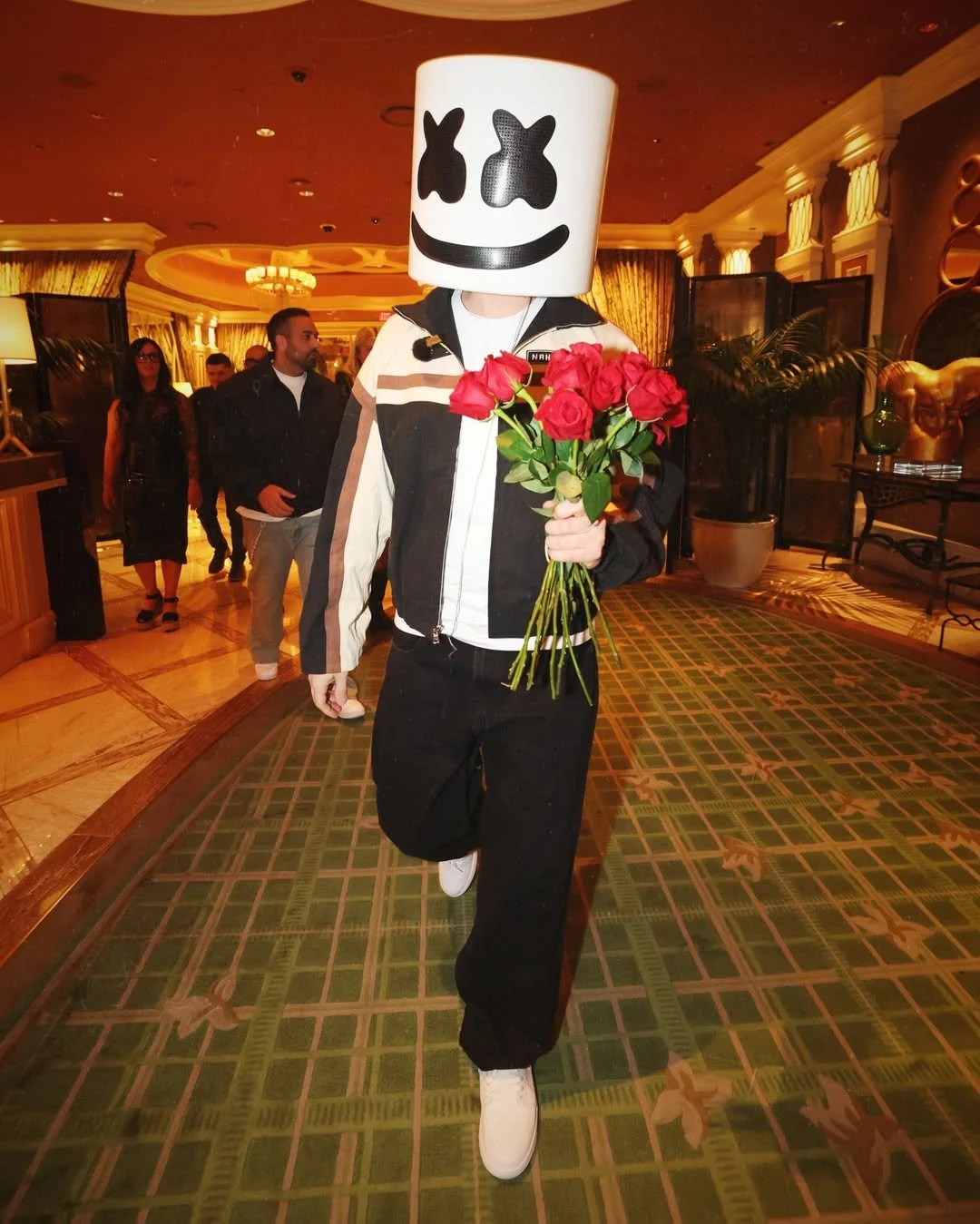 Marshmello Walking through Wynn Las Vegas handing out Roses to guest.