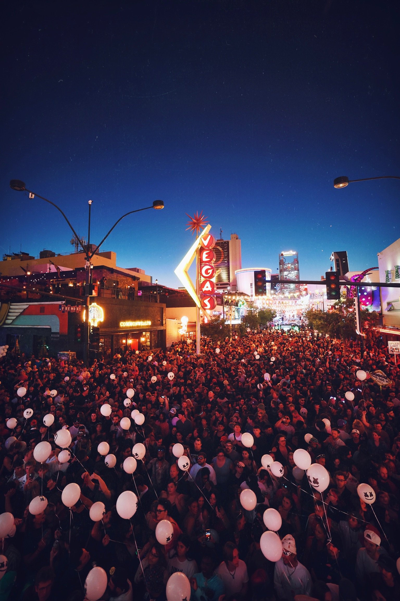 Wide-angle shot of the Feed The Block main stage in Downtown Las Vegas, showcasing professional stage lighting, massive LED screens, and high-production value for local music festivals. @dmahoneyphoto