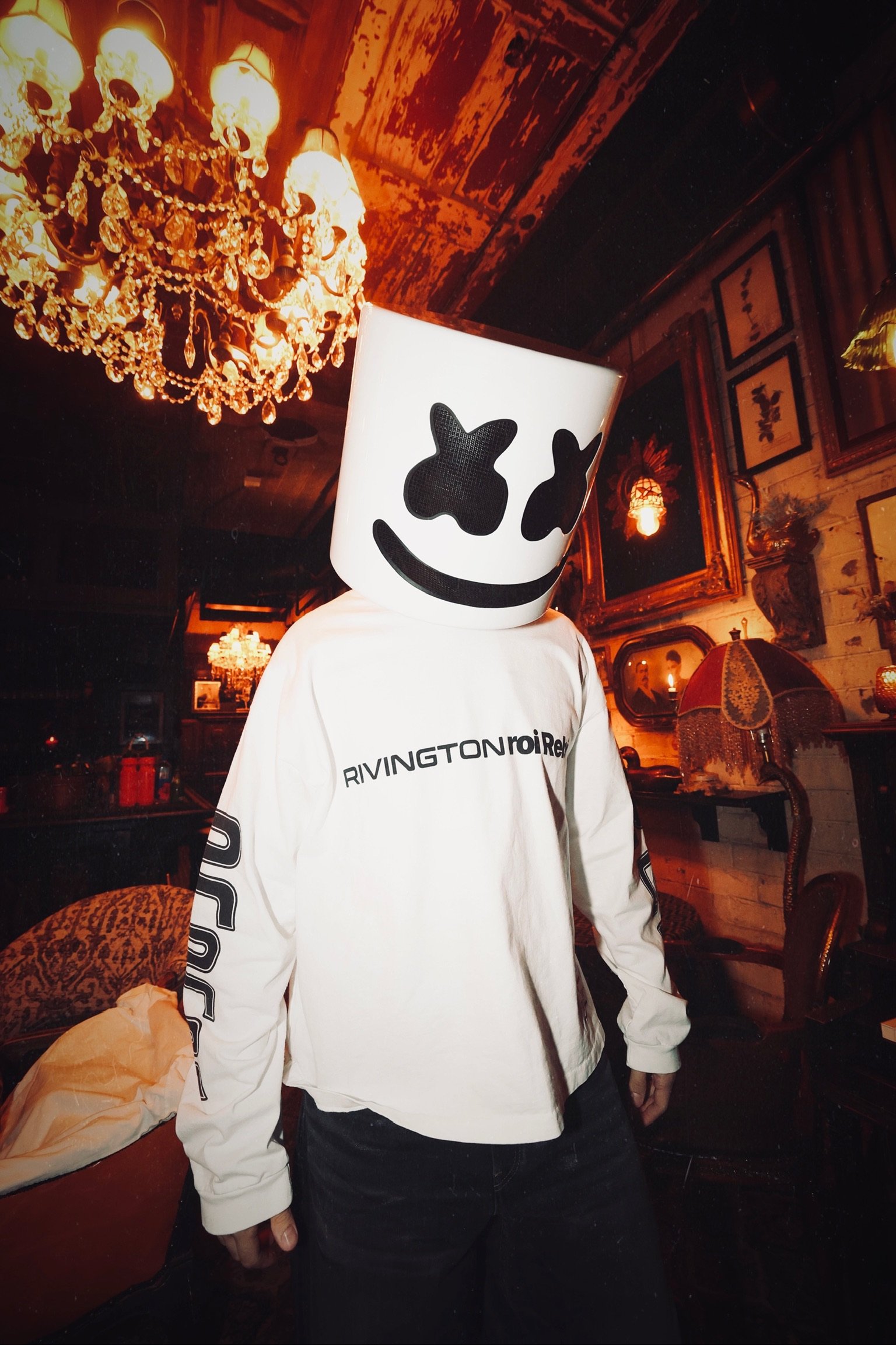 DJ Marshmello performing live for Feed The Block DTLV, featuring the signature Marshmello helmet and white crowd balloons in an immersive Downtown Las Vegas nightlife setting. @dmahoneyphoto