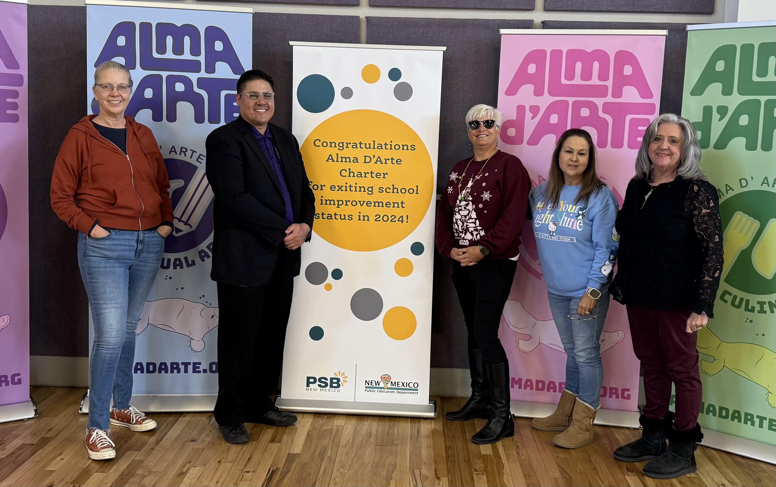 Alma D'Arte Charter School: Chief Academic Office Adam Amador, Governing Board member Richelle Peugh-Swafford, staff