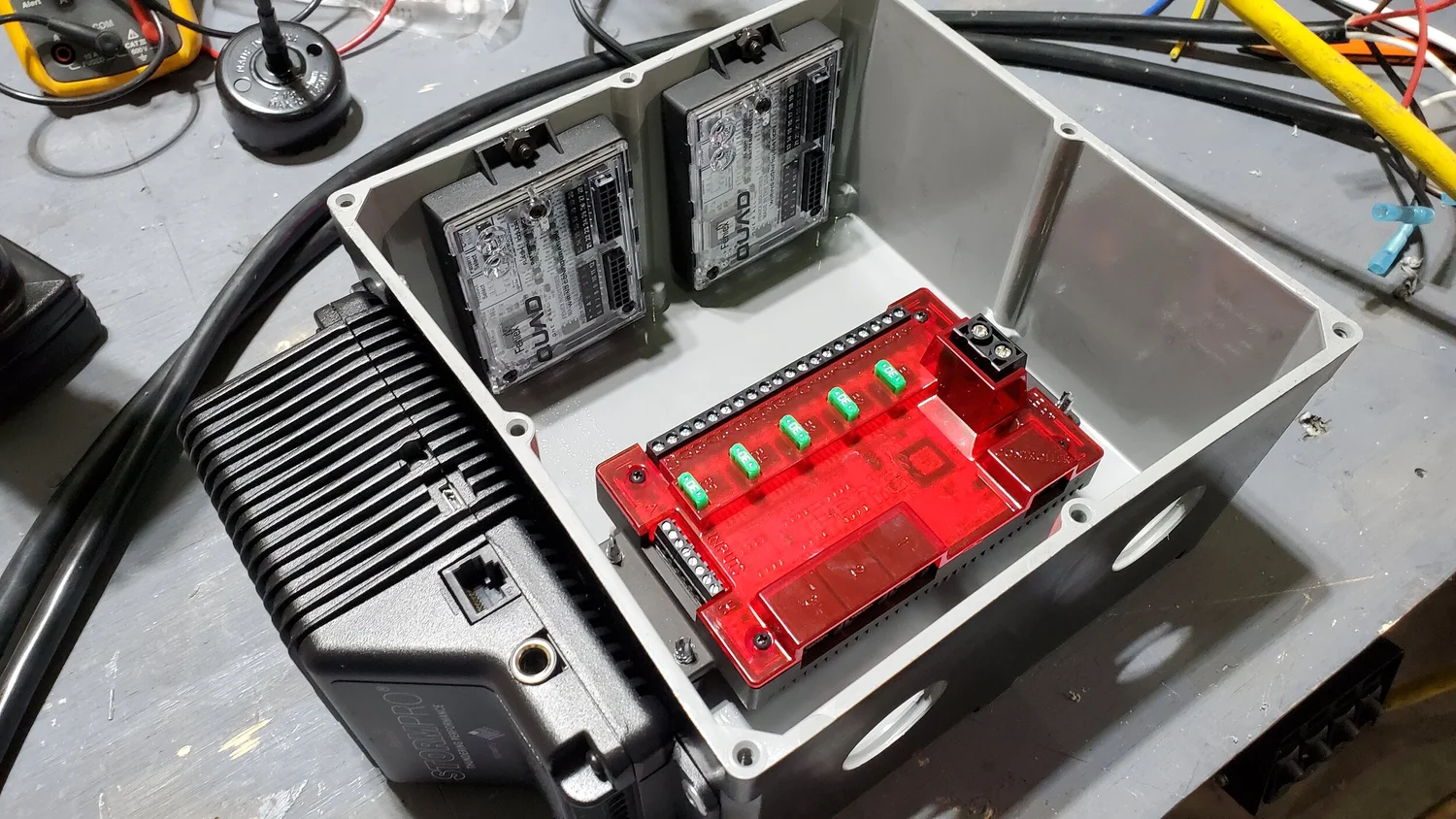 Vehicle power distribution and controller assembly