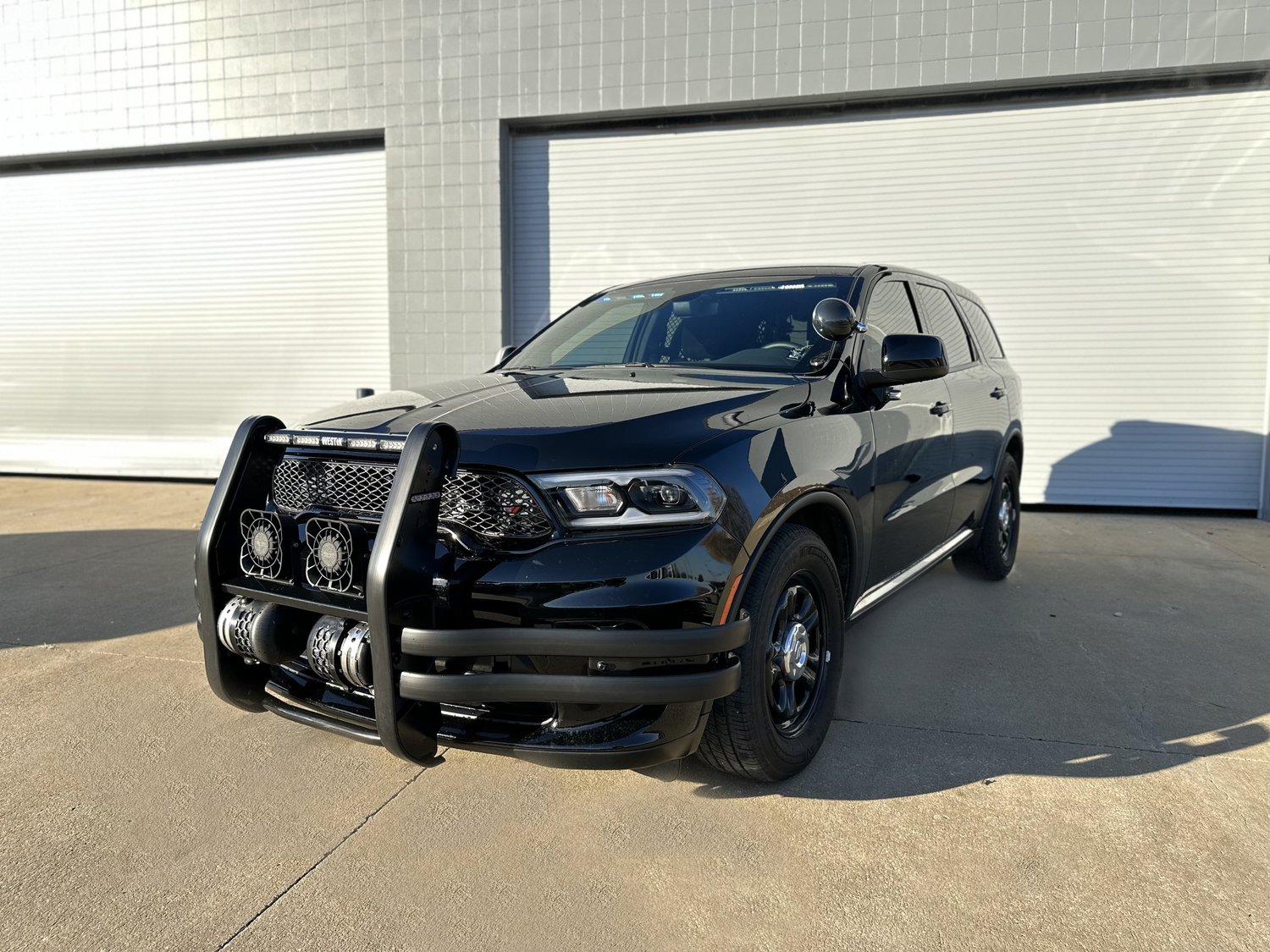 Pre-owned public safety vehicle with emergency equipment