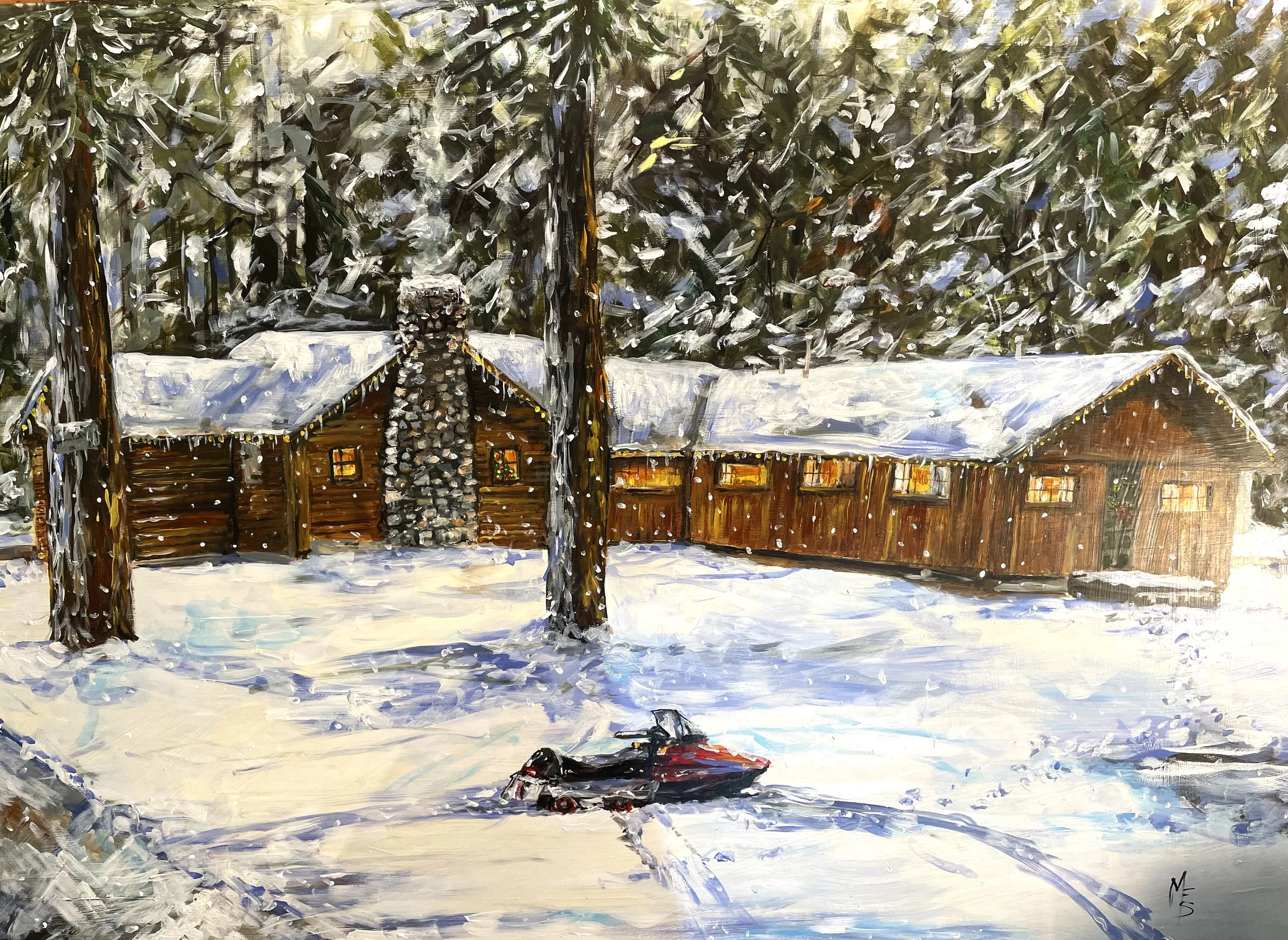A winter scene with a snow-covered log cabin, surrounded by tall pine trees. The cabin features a stone chimney, glowing windows, and icicles hanging from the roof. A snowmobile is parked in the foreground on the snowy ground.