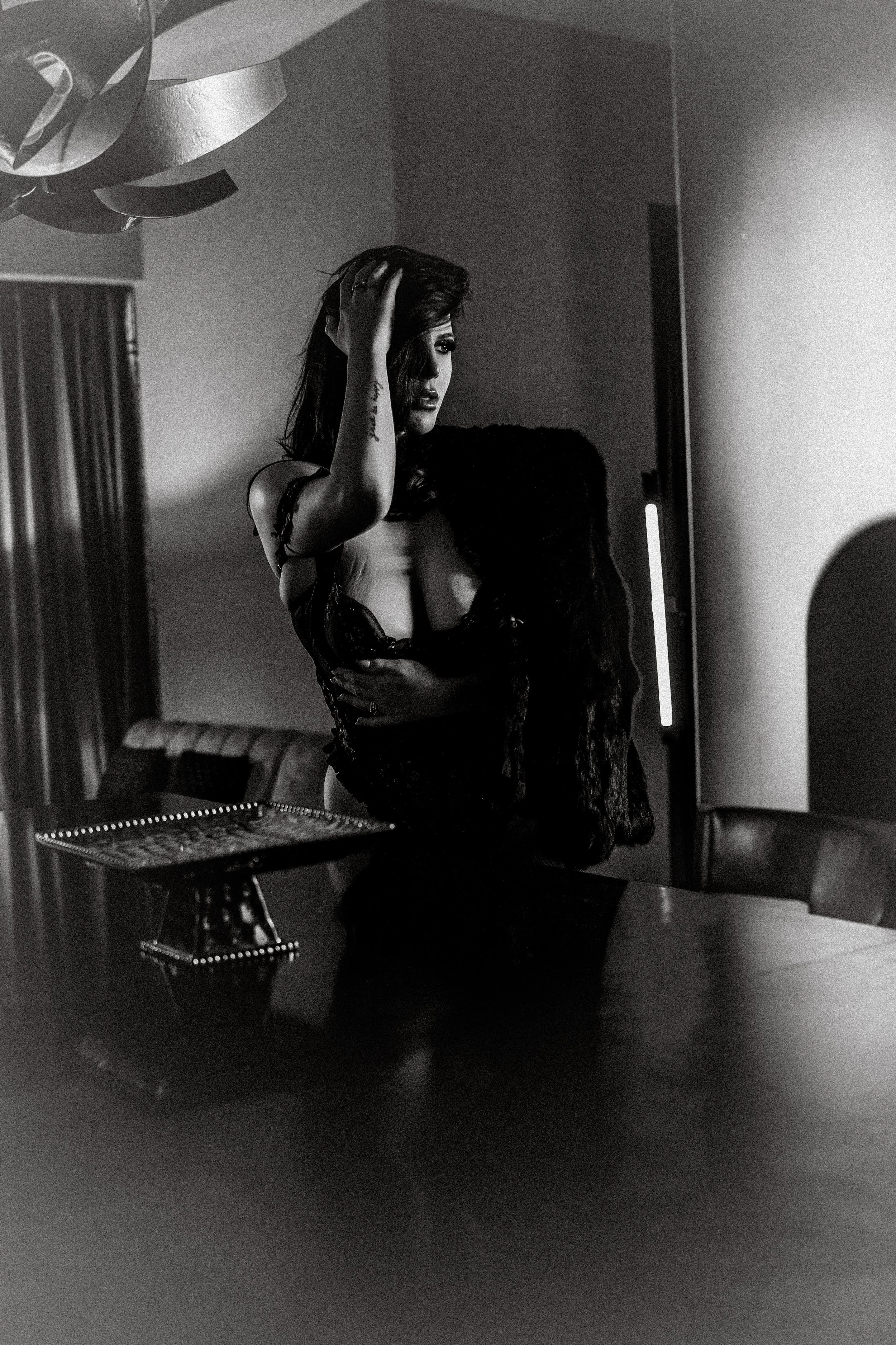 Luxury boudoir studio portrait showing confident woman in elegant lingerie photographed by San Jose boudoir photographer