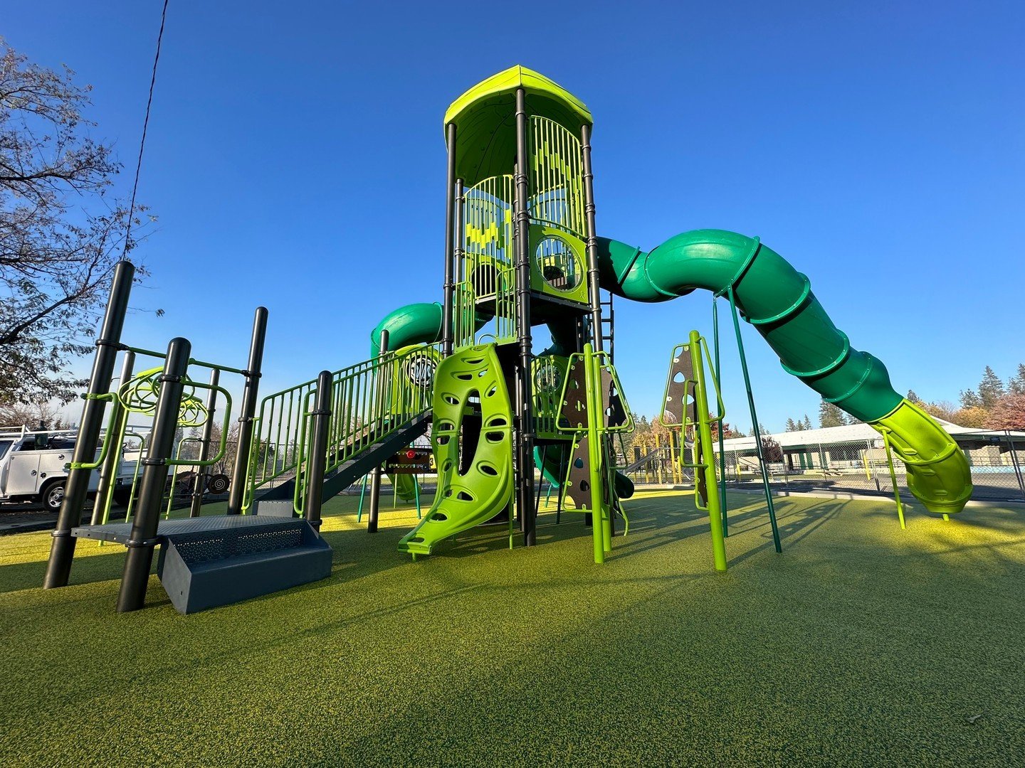 Playground adventures await! Whether it's climbing up high, sliding down low, or spinning around, there's magic in every moment at the playground. Who wouldn't want to be here when you have a play area that looks this good? #outdoors #playgrounds #Cr