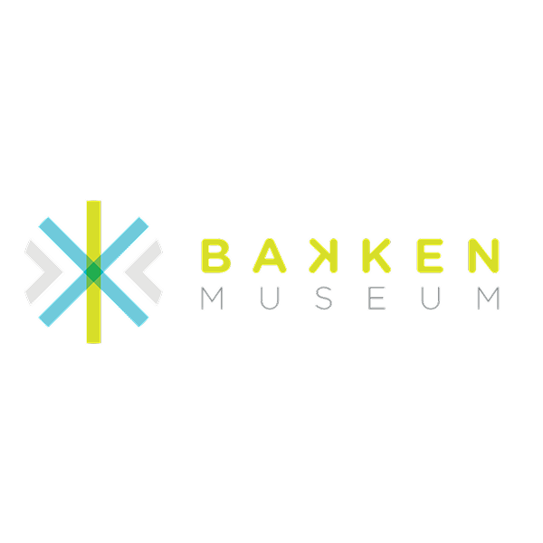 The logo for the Bakken Museum featuring a colorful, stylized geometric butterfly design in blue, gray, and yellow, with the text 'Bakken Museum' in bright green and gray letters on a black background.