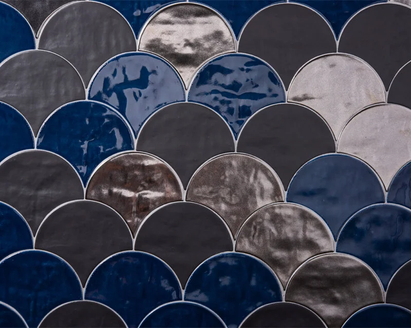 Mixing colors and finishes is a great way to customize your home. Here we have a blend of crackle and metallic glazes giving the tile a more movement and variation.