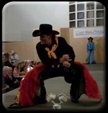 These chaps features a hard to find red angora. The wings are yellow, overlaid with blackcalf leather sunf lowers with a rinestone in the center of each, and beautiful leaves. The boarder is buck stitched by hand in yellow and finished off in black k