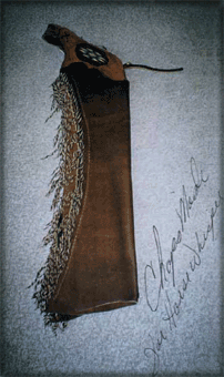 These chaps were made for the Horse Whisperer movie, featuring inset horsehair in the tooled belts and twisted fringe.