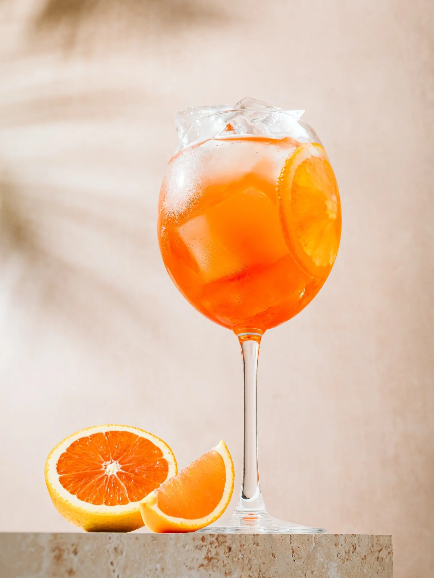 Aperol Spritz, yes please. 

I love the simplicity of a minimally styled set, but it&rsquo;s rarely simple. Setting up the ice, citrus, light, and shadows came together quickly, but refining each detail into the perfect place always takes time. 

Ins