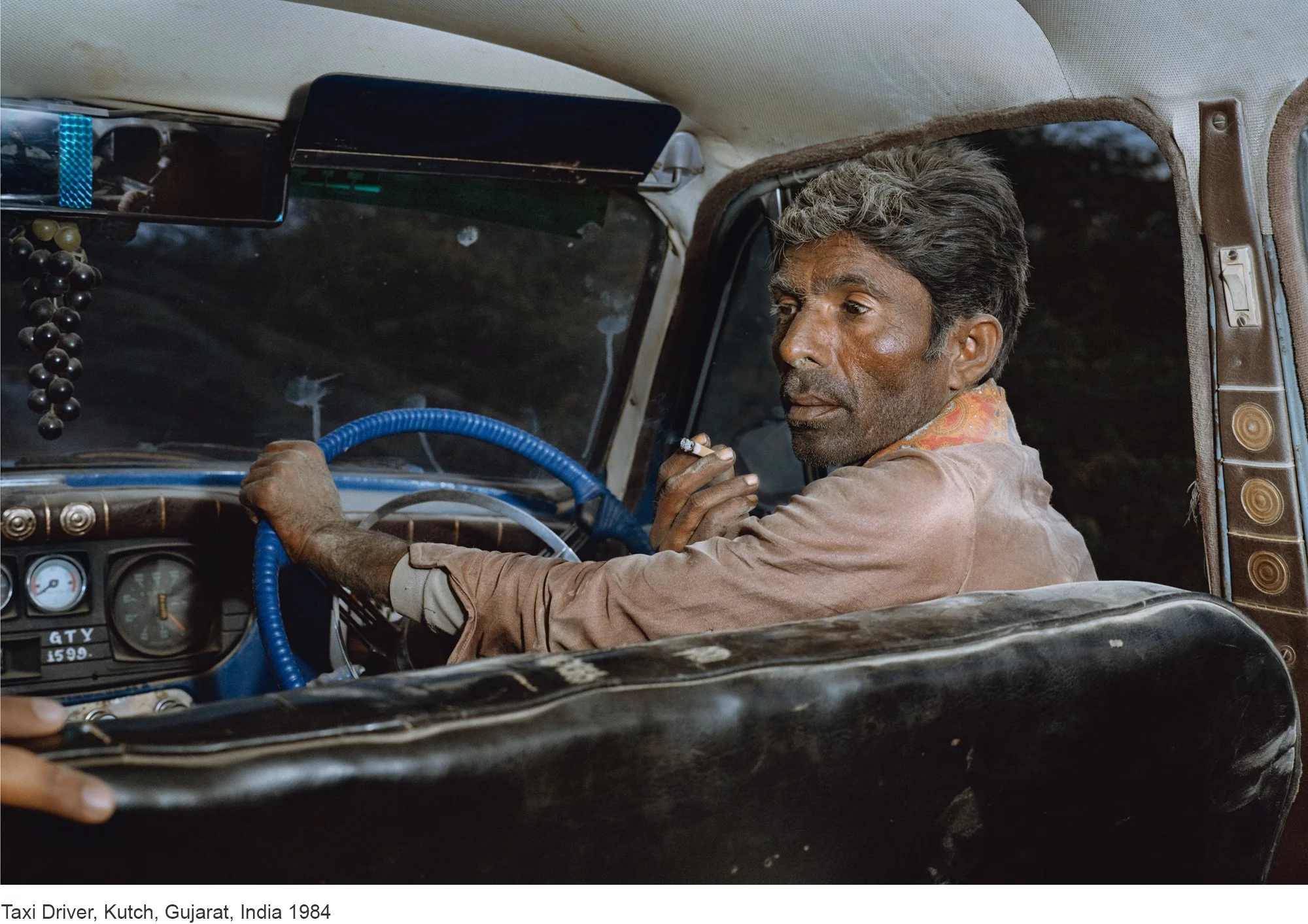 3-Mitch Epstein-33_F.301.84-5 Taxi Driver, Kutch, Gujarat, India 1984.jpg
