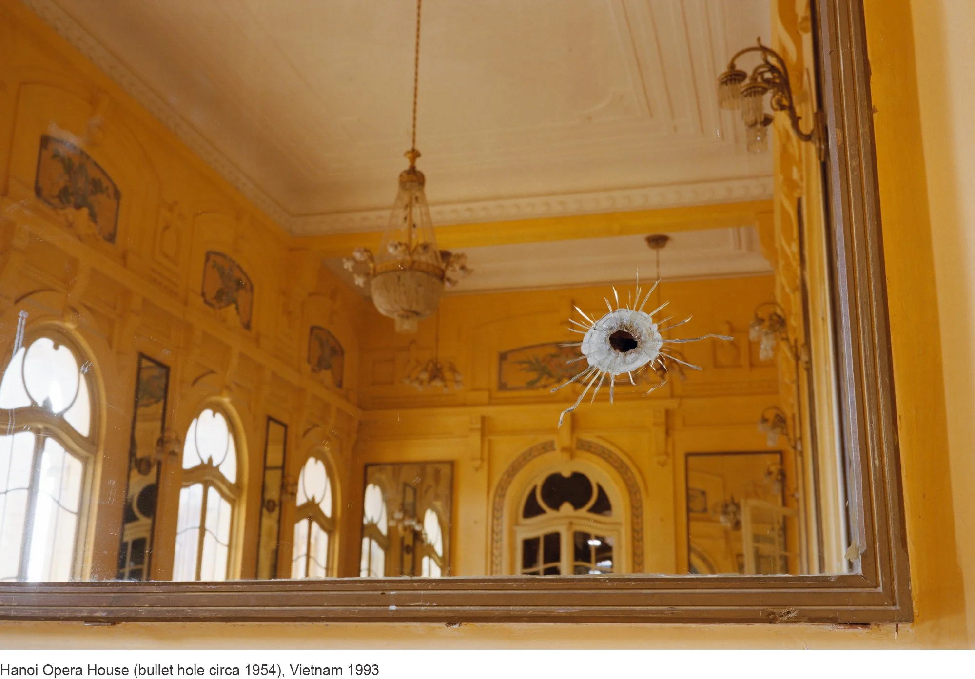 3-Mitch Epstein-Hanoi Opera House (bullet hole circa 1954), Vietnam 1993.jpg
