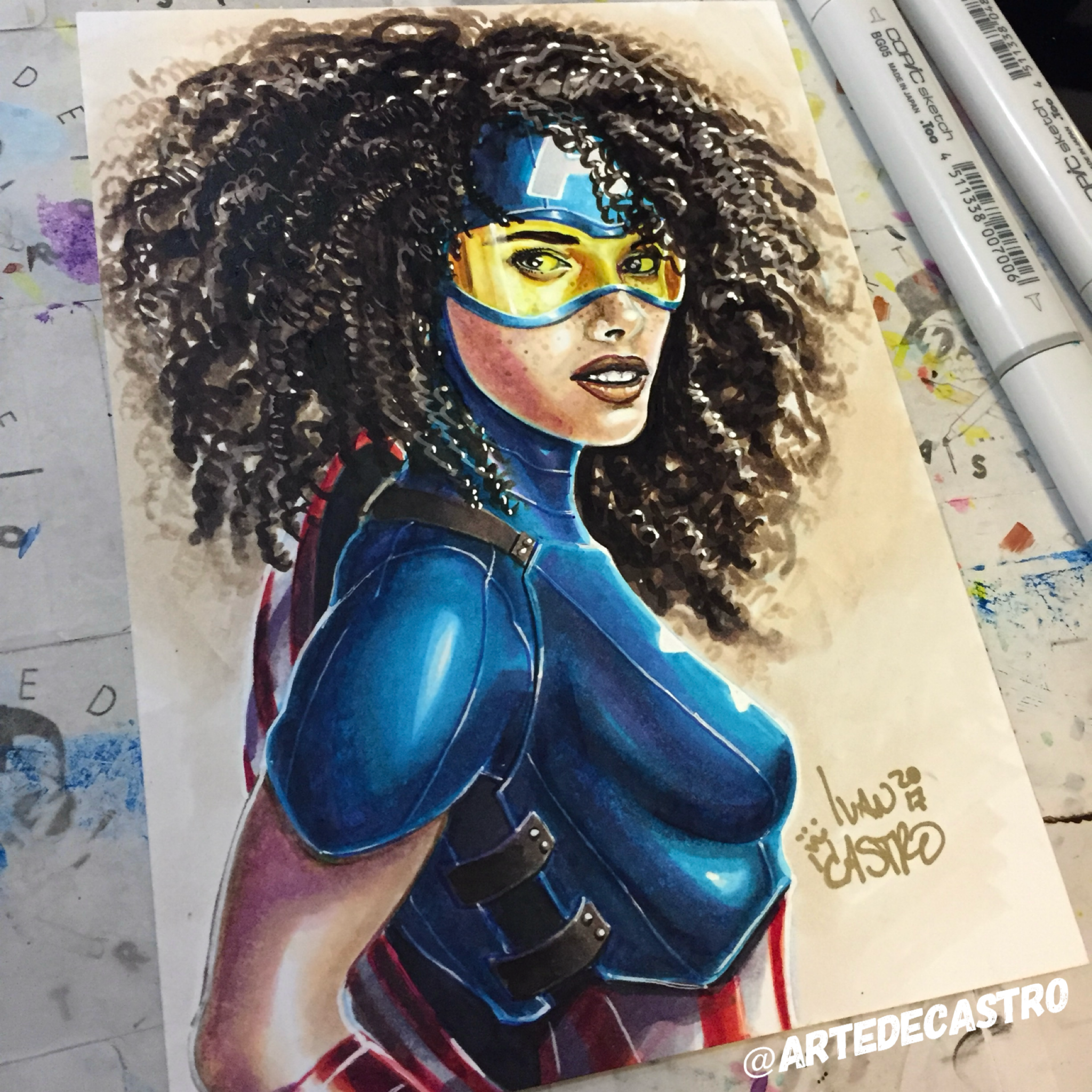 Colorful illustration of a woman with curly hair wearing a blue headband and a blue top, looking towards the viewer. The artwork is on paper and has a vibrant and expressive style.