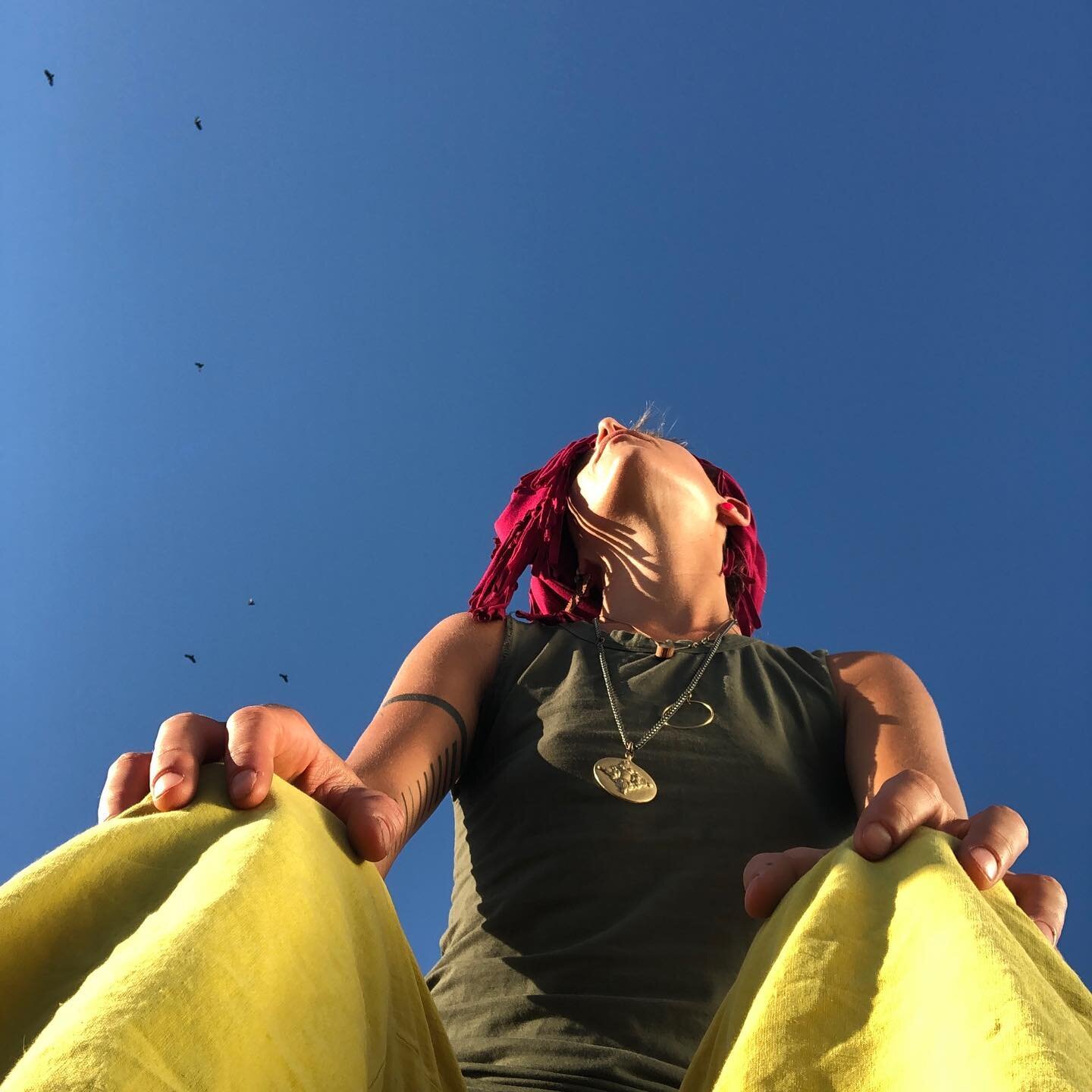 I and the sky. 
Birds flying high. 
Now. Rooftop. Oakland 

Camera held in between my feet

#colorcoordinated #selfportrait #sunlight #art #bluesky #iamart #color #vibrant #vibratehigher #solarpowered #westoakland #balancinglifeasart