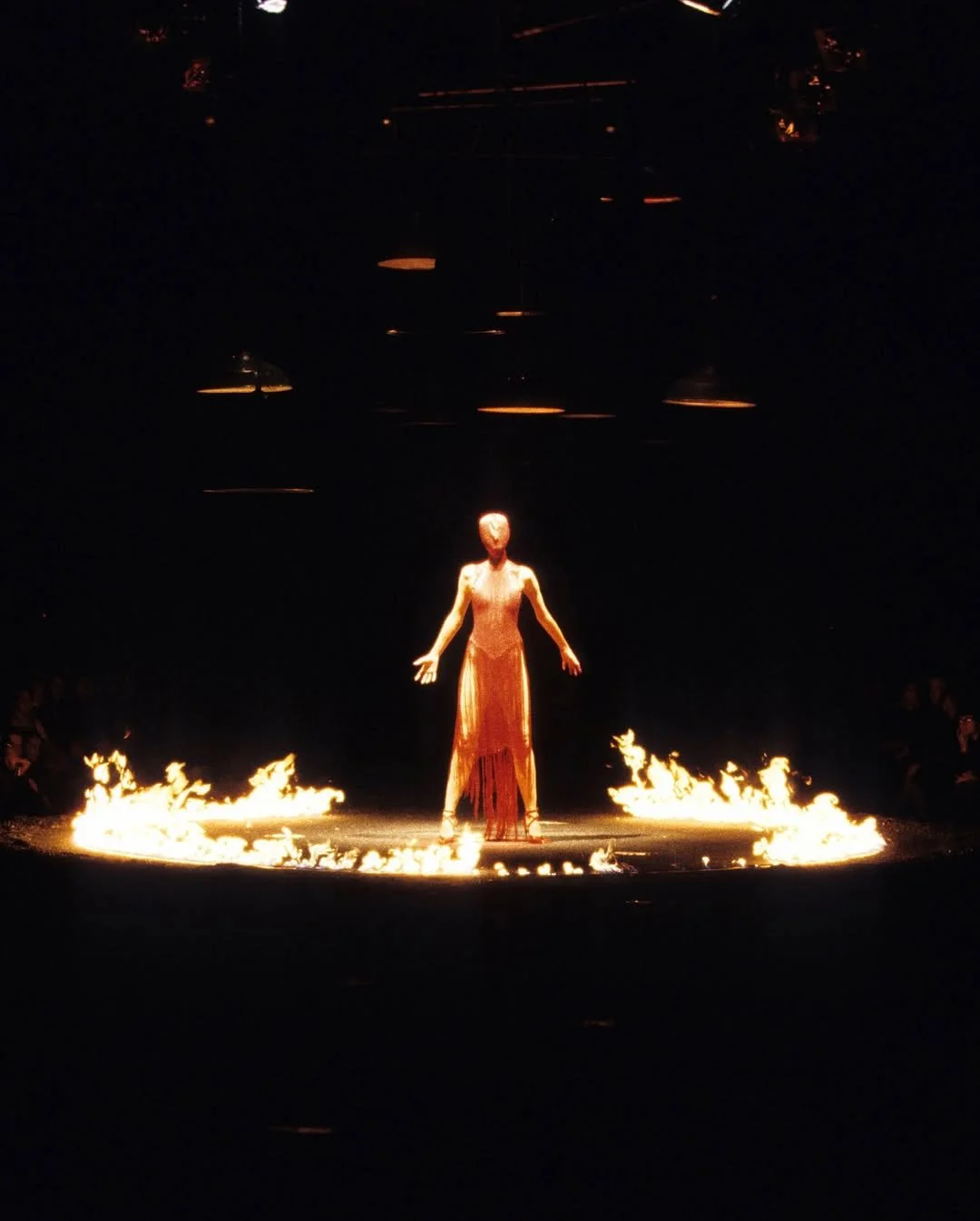“After water, there must be fire.”Lee Alexander McQueen understood that fashion was never just a (3).jpg