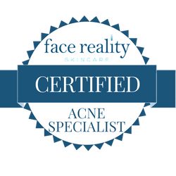 Licensed esthetician providing Face Reality acne treatment program in Minnesota skincare studio.
