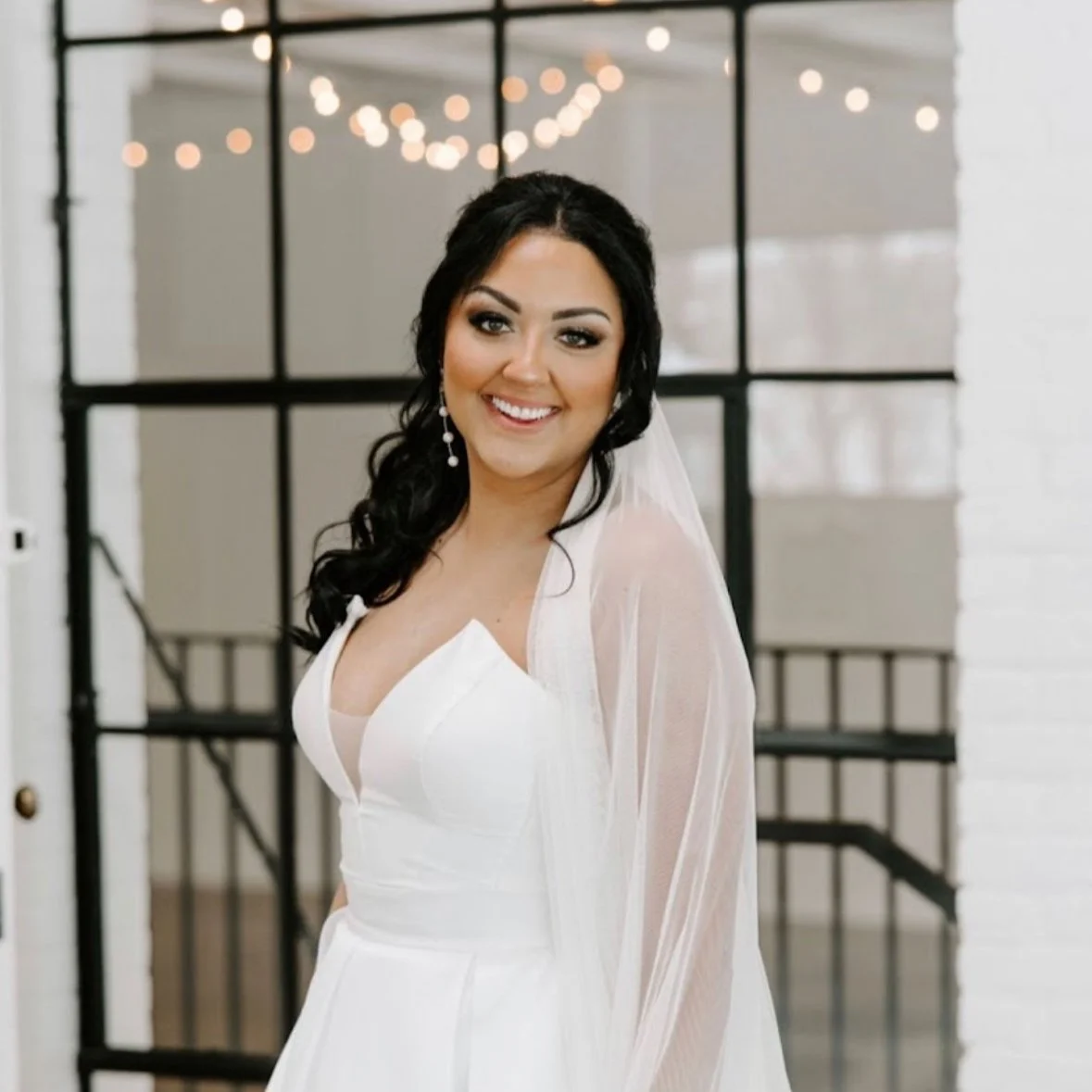 Minnesota bride with glowing, flawless skin on her wedding day after months of bridal skincare treatments.