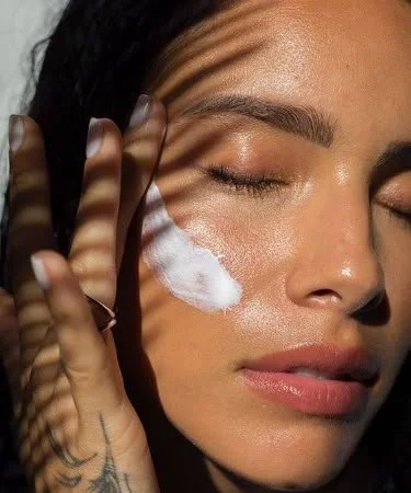 Licensed esthetician performing Face Reality acne treatment at The Skyn Distillery in Wayzata, MN.