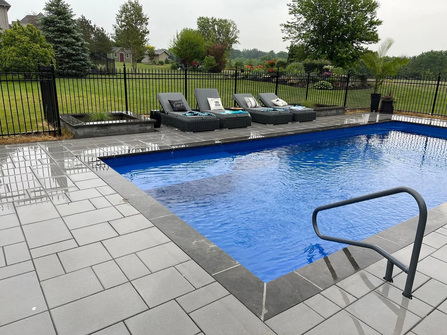 Finally got some pictures from one of our pool projects last year #landscaping #interlock #unilock #pools #backyardtransformation #hardscaping