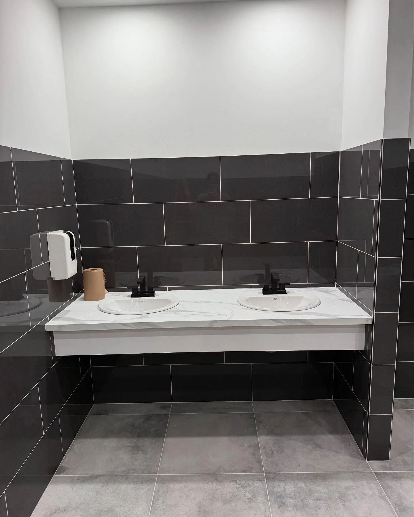 Commercial bathrooms nearly wrapped up. Just waiting on the partitions.