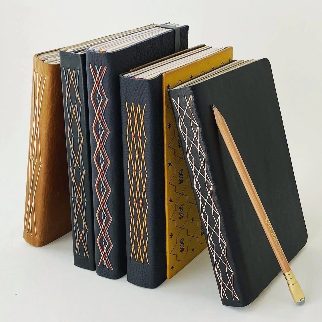 Criss-cross fancy stitched A5 leather journals
