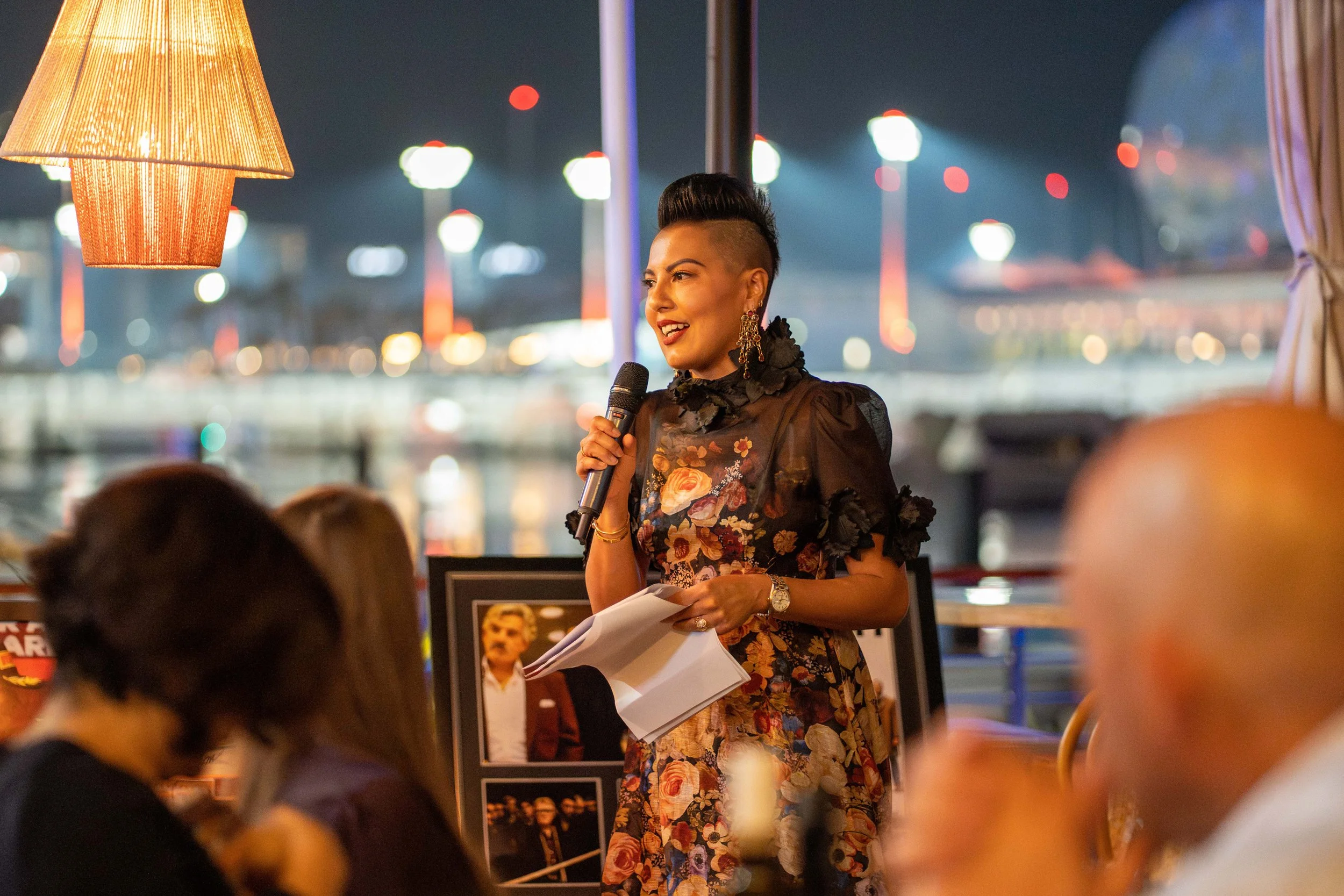 Sharon Pakir speaking on stage at the Taste Of Australia event