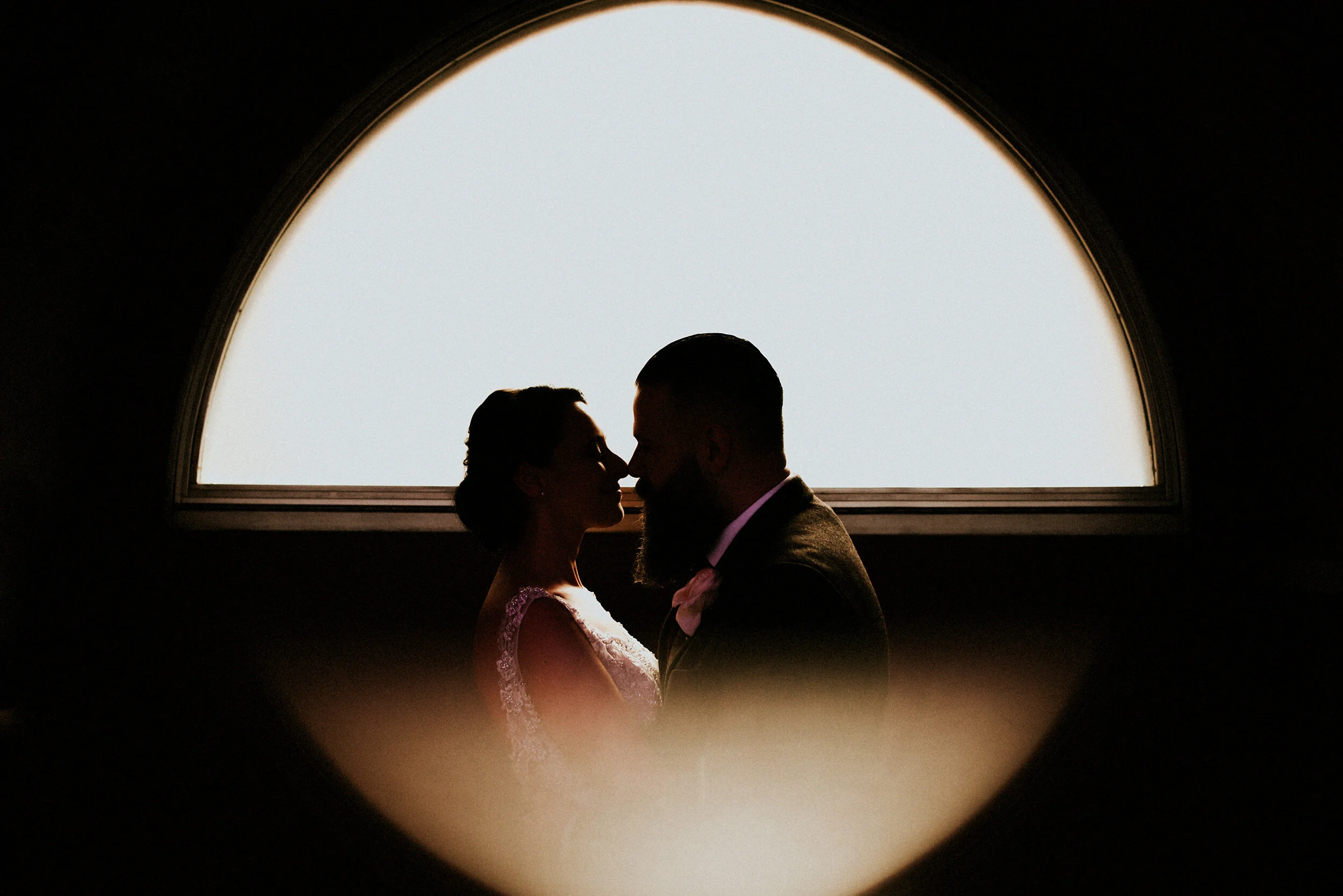 alternative-creative-leeds-wedding-photographer-windows-mirror-image-bride-groom-emotion-aspire.jpg