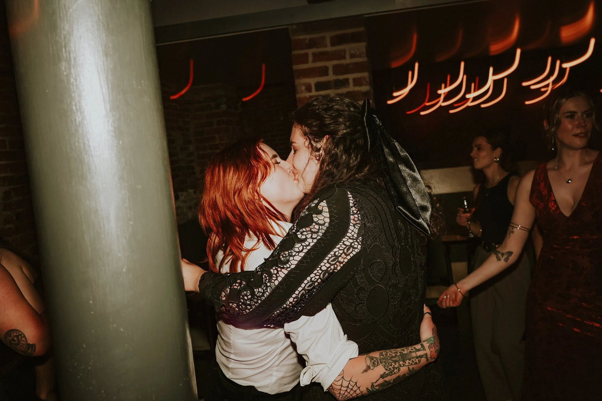 Two Brides kiss on the Shears yard dance floor in this Leeds wedding.