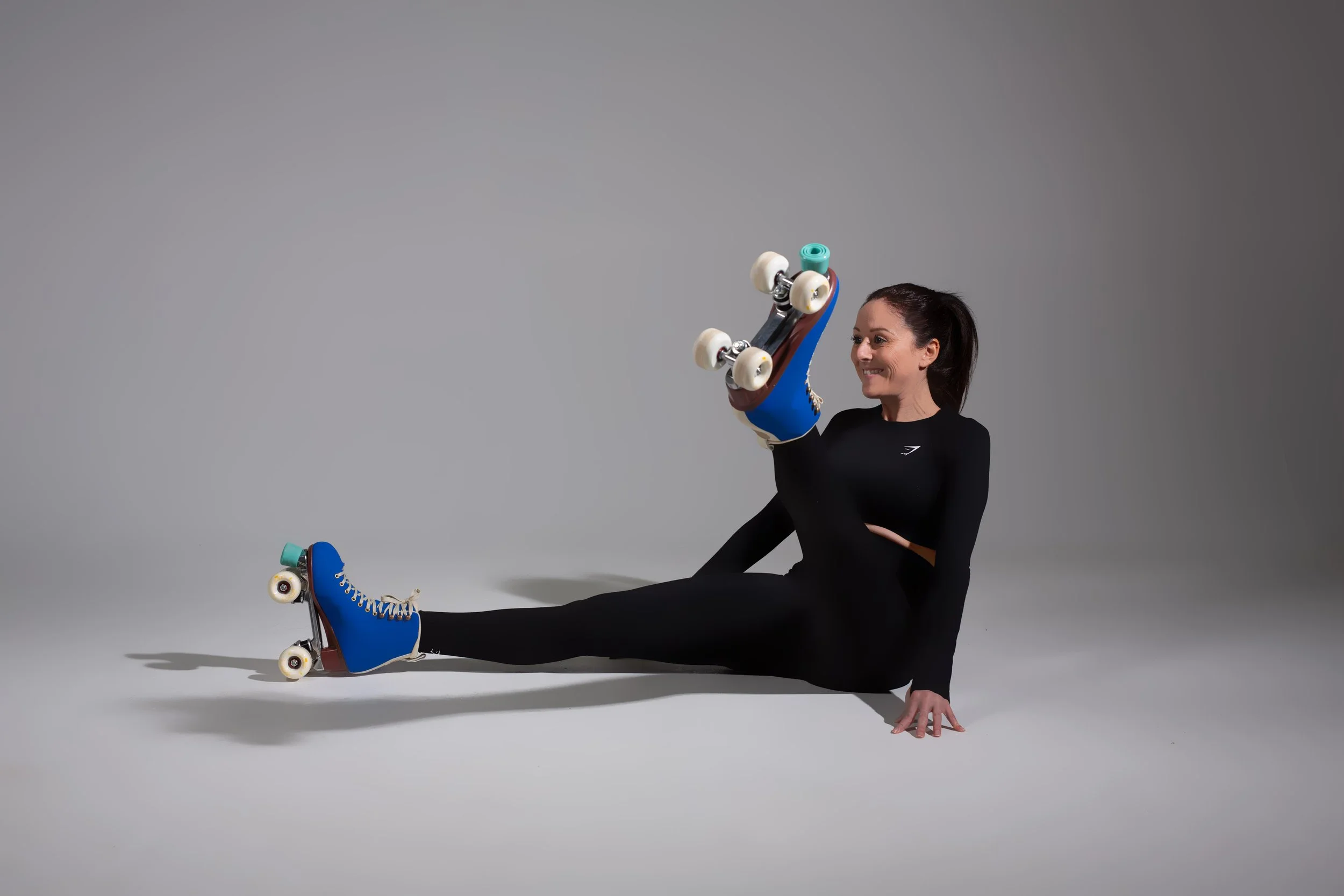 rollerfitness straddle raised leg kicks.jpg