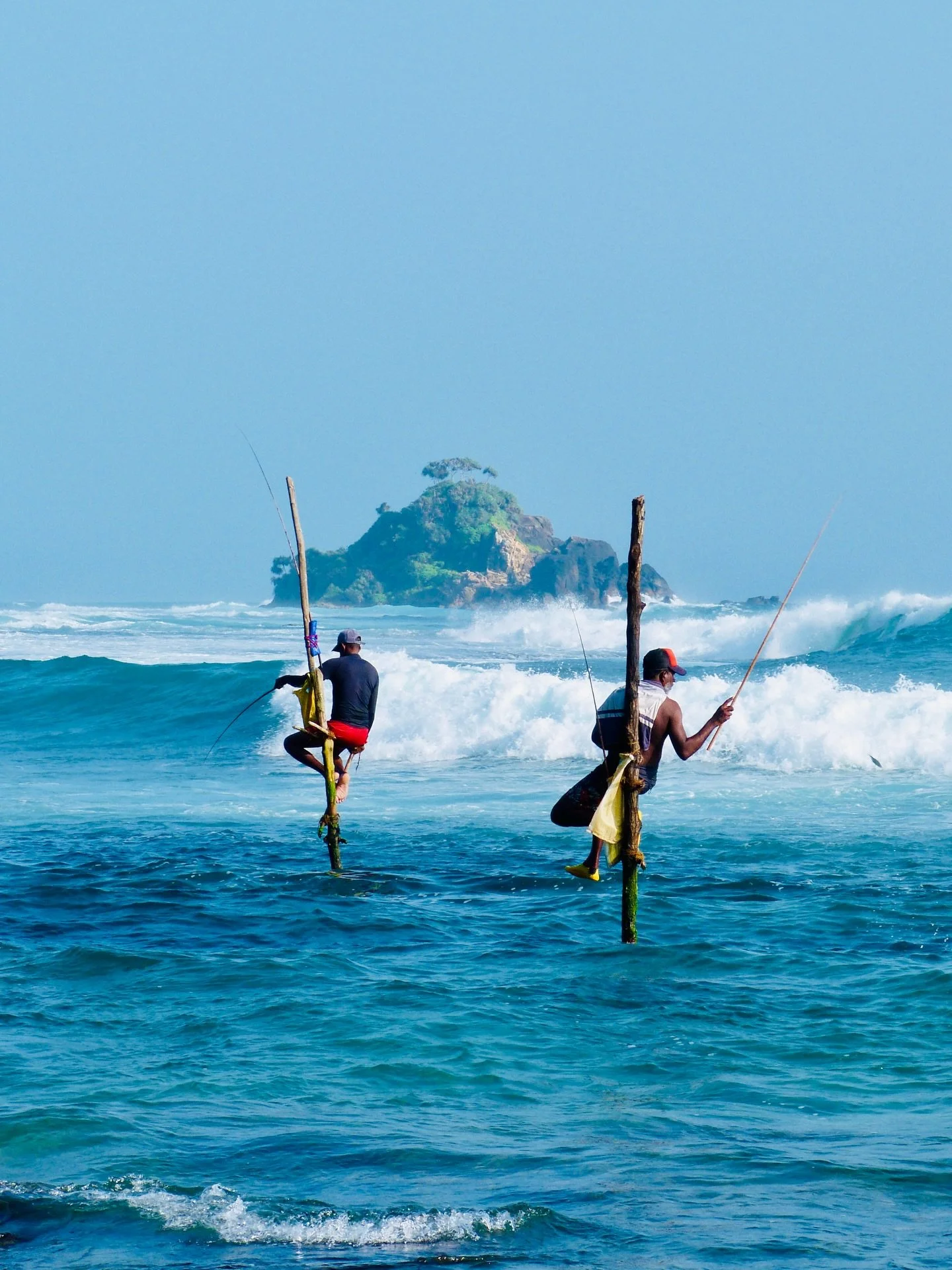 @natgeotravel do you want this pic? 🥹 i&rsquo;m proud of this shot!

a moment that felt like a movie. the combination of the fisherman, insane waves &amp; the sun setting - absolutely one of the highlights of our crazy upside down trip to Sri Lanka.
