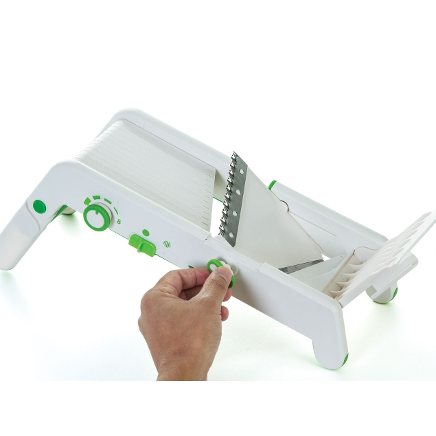 The waffle cutting blade switches with a simple flip and then gets hidden by the front deck
