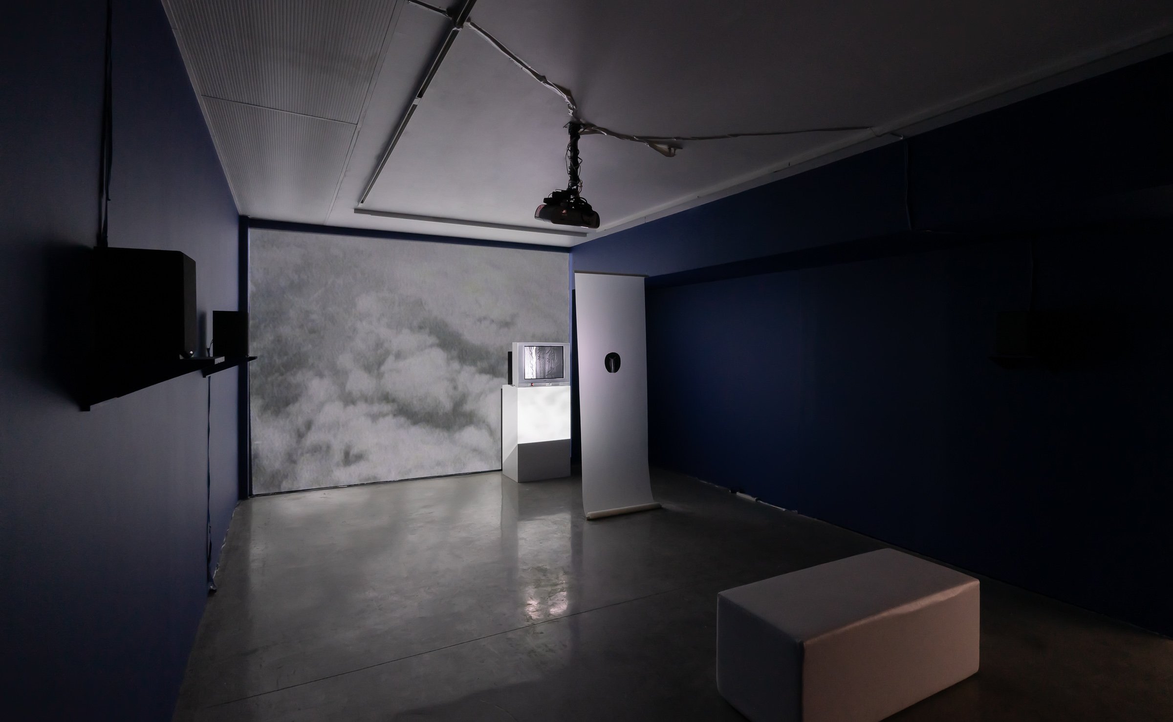   Between Departure and Arrival , 1997, two-channel video installation, sound, print on mylar scroll, Variable dimensions, 9 minutes, 51 seconds (loop). Collection of the artist. Photo by Blaine Campbell. 
