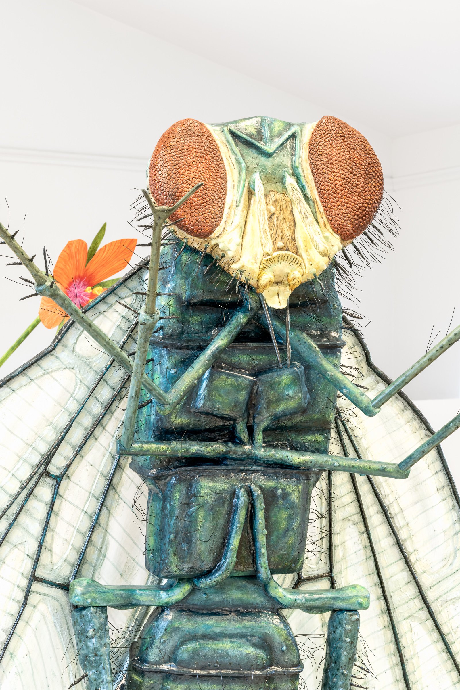   Next World Emissaries: Blue Bottle Fly , wood, papier-mâché, textiles, wire, acrylic, 2021. Courtesy of the artist. Photo by Blaine Campbell. 