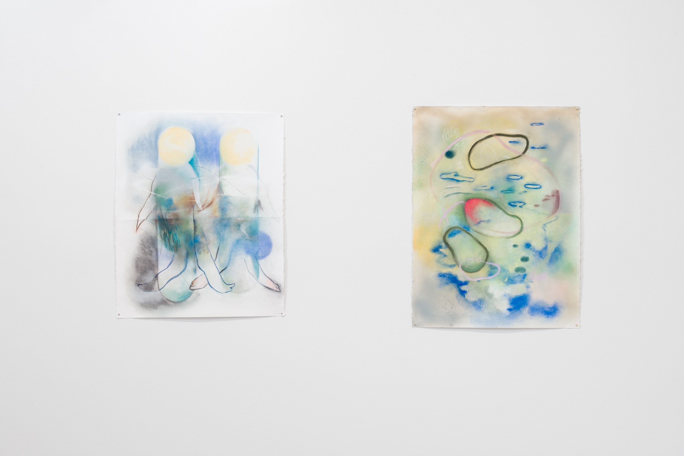  Installation view of  Gathering near and far, still  by April Matisz showing (l to r)   Cloud-thinking , pastel and spray paint on paper 2022 and  Together we are Moons , pastel and spray paint on paper, 2022. Courtesy of the artist. Photo by Blaine
