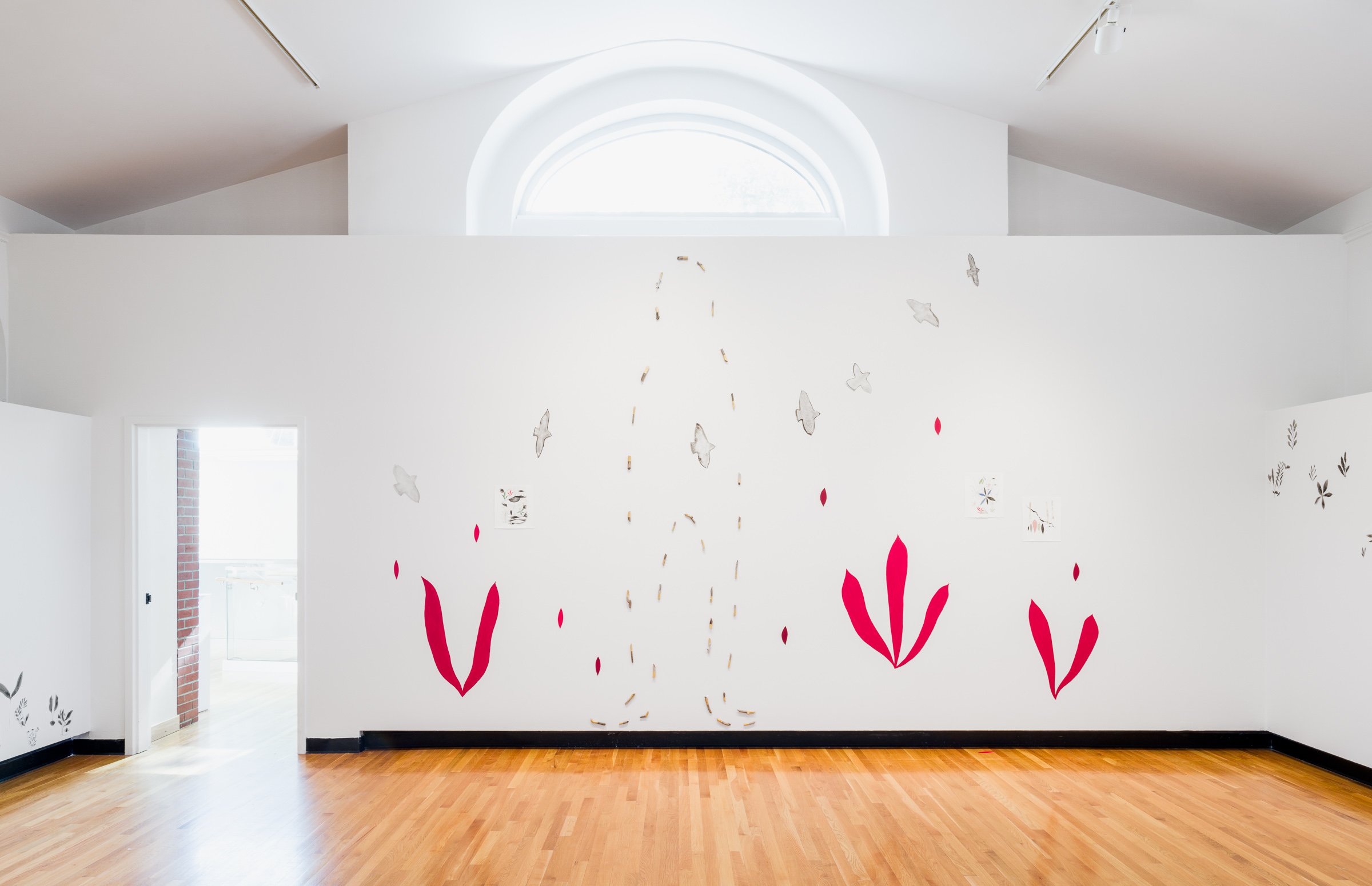  Installation view of  Gathering near and far, still  by April Matisz showing  Just Passing Through,  wood, paint, and India ink on yupo paper, 2023. Courtesy of the artist. Photo by Blaine Campbell. 