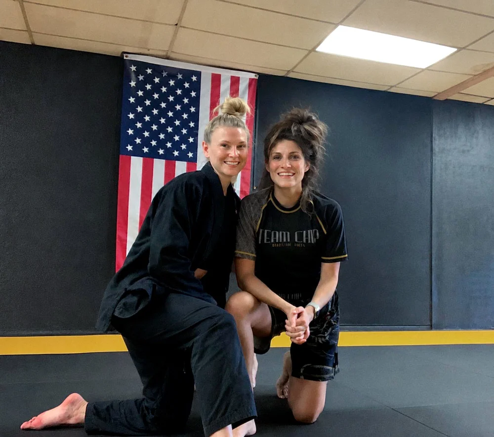 Two Team Chip Women's Jiu Jitsu students