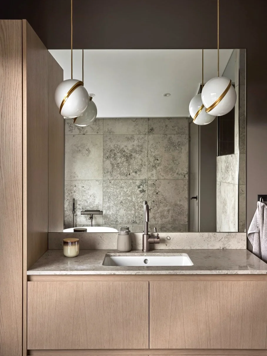 Dreaming of a bathroom where every detail radiates calm, luxury, and timeless design? 

Here, nature&rsquo;s harmony meets modern elegance &ndash; with warm wood accents, soft stone surfaces, and a freestanding bathtub with a view that invites pure r