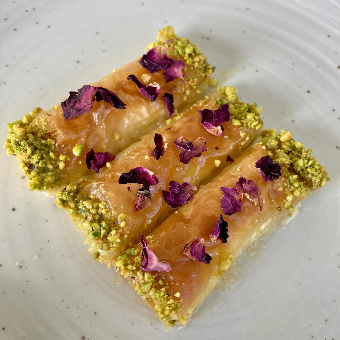 Welcome the newest addition to Binti&rsquo;s rotating menu: clotted cream fillo rolls 🤤 with or without edible rose petals. London meets Lebanon with these British clotted cream filled crispy fillo rolls covered with rose water and pistachio. Try so