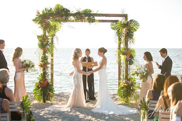 @johncainphotography explained Gina + Frances' wedding perfectly. He said, "I will never forget how this wedding felt like an entire community surrounding them with their love and support&mdash; It&rsquo;s hard to put into words how the couple seemed to be enveloped by all of their loved ones." ⁣
.⁣
It truly was a whole day full of love. ⁣
⁣
Planning &amp; Design: @kellyamcwilliams⁣
Photo: @johncainphotography⁣
Venue: @tweenwaters⁣
Florals: @floral_symphonyfl⁣
⁣
#napleswedding #naplesflorida #destinationwedding #destinationweddingplanner #naplesweddingplanner #floridaweddingplanner #weddinginspiration #weddinginspo #weddingdetails #weddingideas #weddingplanner #weddingflowers #luxurywedding #weddingdesign #weddingplanning #engaged #eventdesign #weddingstyle