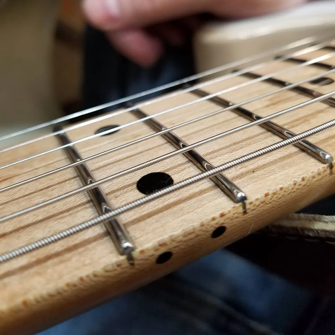 One of our Rumpel-Casters after we dressed and polished the frets. Fresh strings and setup. Lovely guitar!