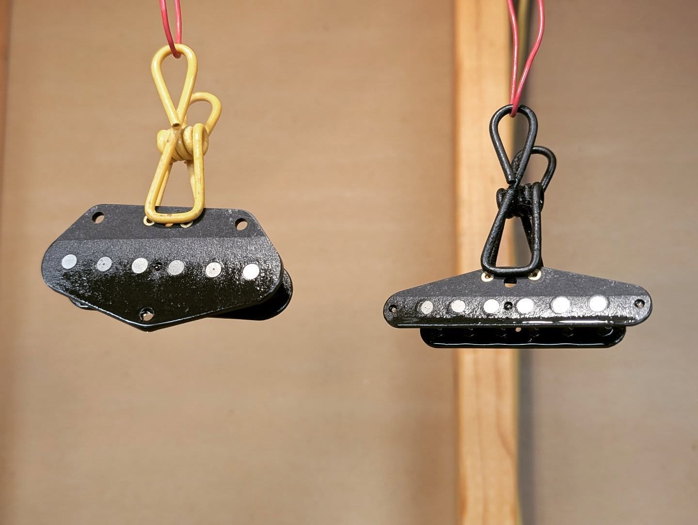 Black Knight bobbins drying after their lacquer dip.

#handwoundpickups #rumpelpickups #nitrolacquer #vintageguitars