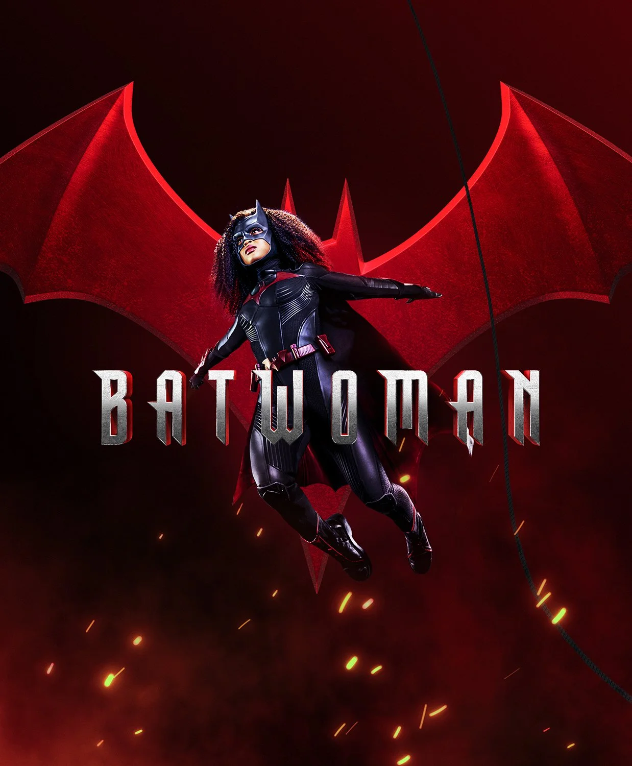 Superhero Batwoman flying in front of a large red bat symbol with sparks and streaks of light in the background.