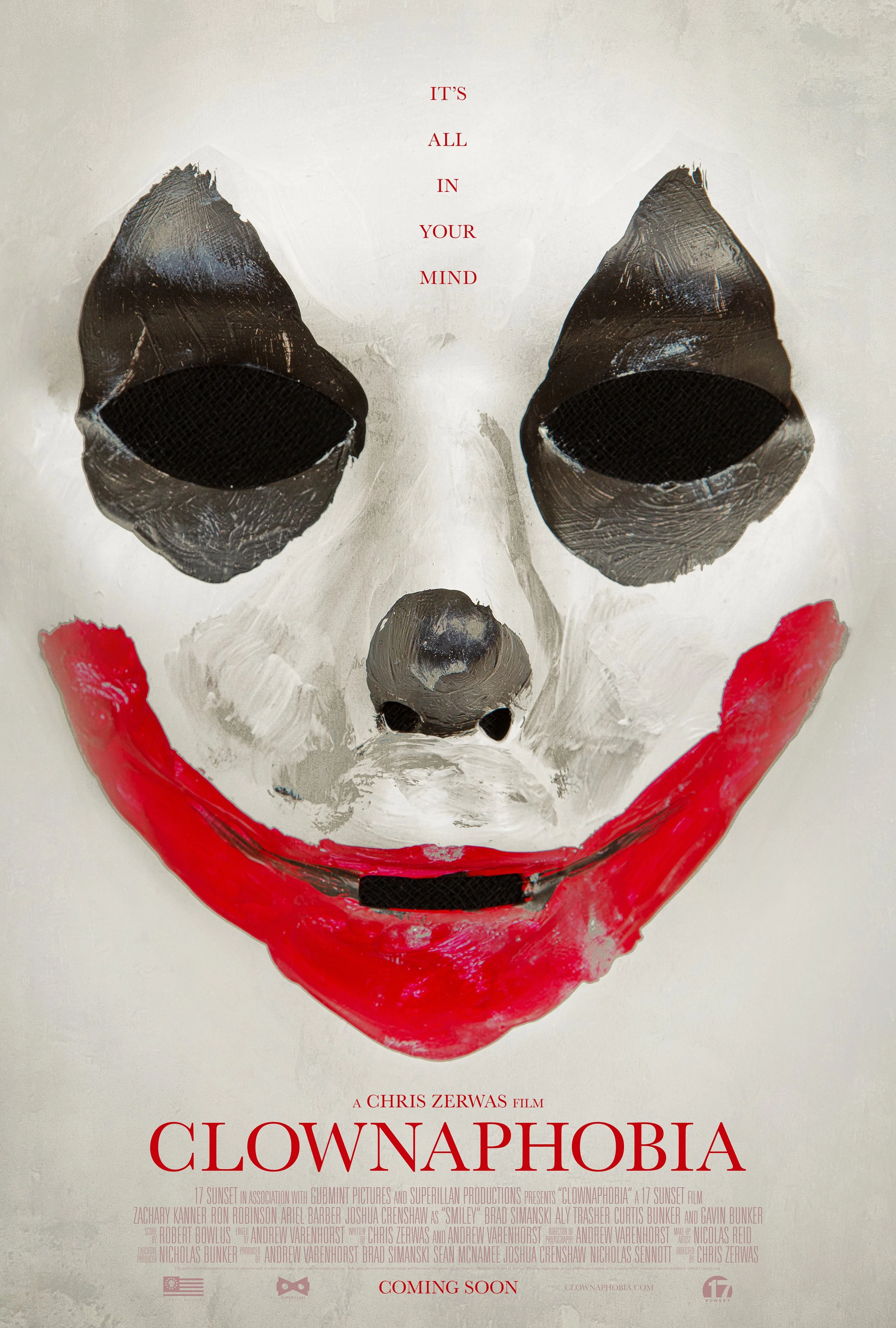 A film poster for 'Clownaphobia' featuring a clown mask with black eye holes, a nose, and red painted lips. The tagline says 'It's all in your mind.' The poster indicates the film is coming soon.