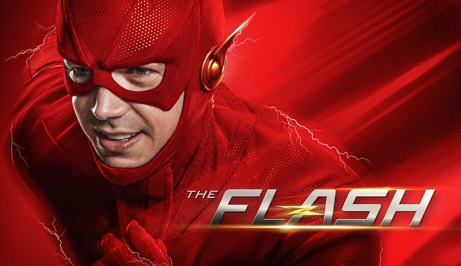 Close-up of The Flash superhero in red suit with lightning and speed effects, featuring his face and the movie title 'The Flash' in bold lettering.