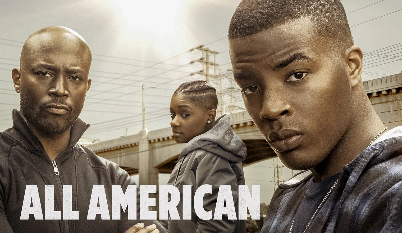Three African American individuals outdoors near a bridge and power lines, looking serious, with the text 'All American' overlayed.